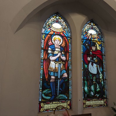 Stained glass windows inside St. Hybald's.